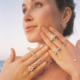 SIRIUS STAR 18K GOLD BAGUETTE DIAMOND RING